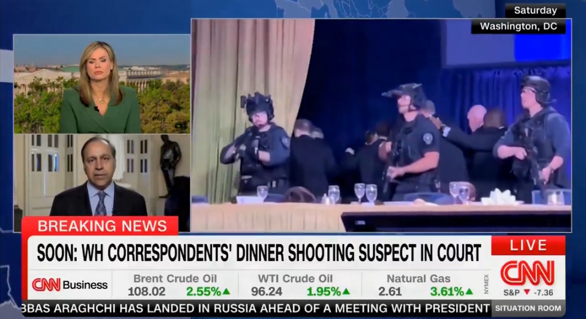 Breaking news coverage of the WH Correspondents' Dinner shooting suspect appearing in court, featuring reporters and law enforcement in Washington, DC.