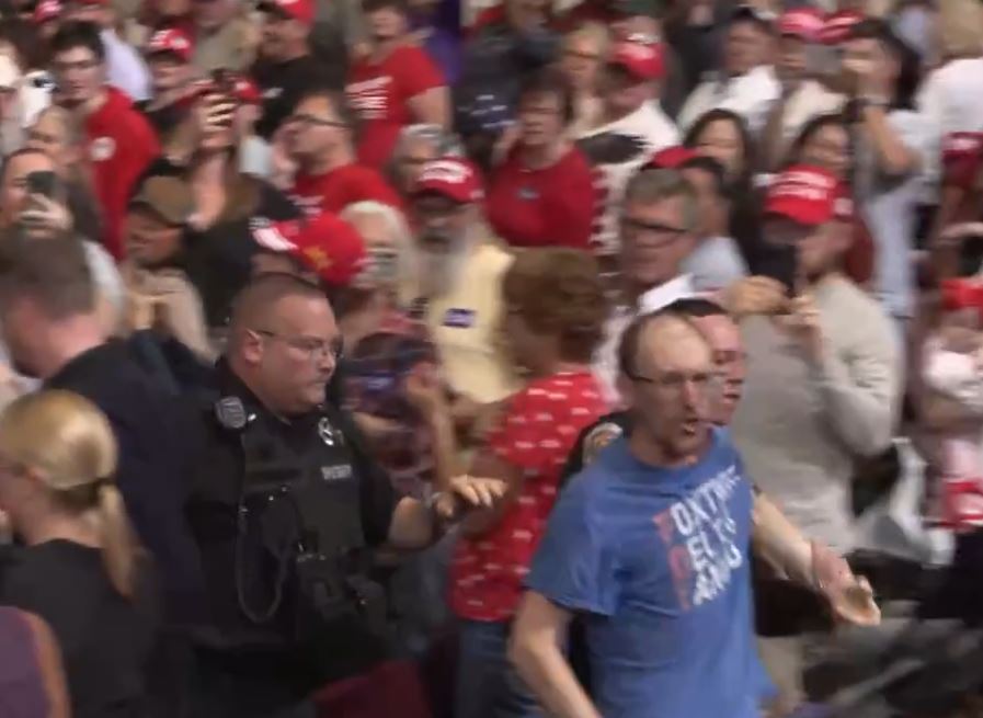 “Really Unattractive” Leftist Gets Clocked After Screaming at Trump at Rally – Trump Calls Supporter “Evander ‘The Real Deal’ Holyfield” – CROWD ROARS! (VIDEO)